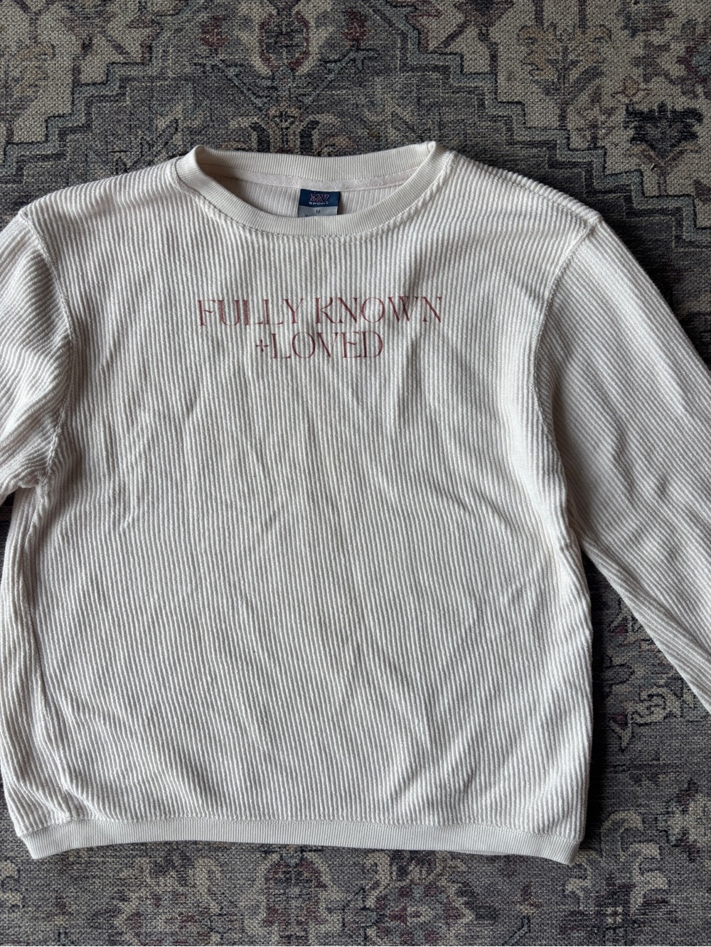 Cream Ribbed Crewneck Sweatshirt with Subtle Pink Text